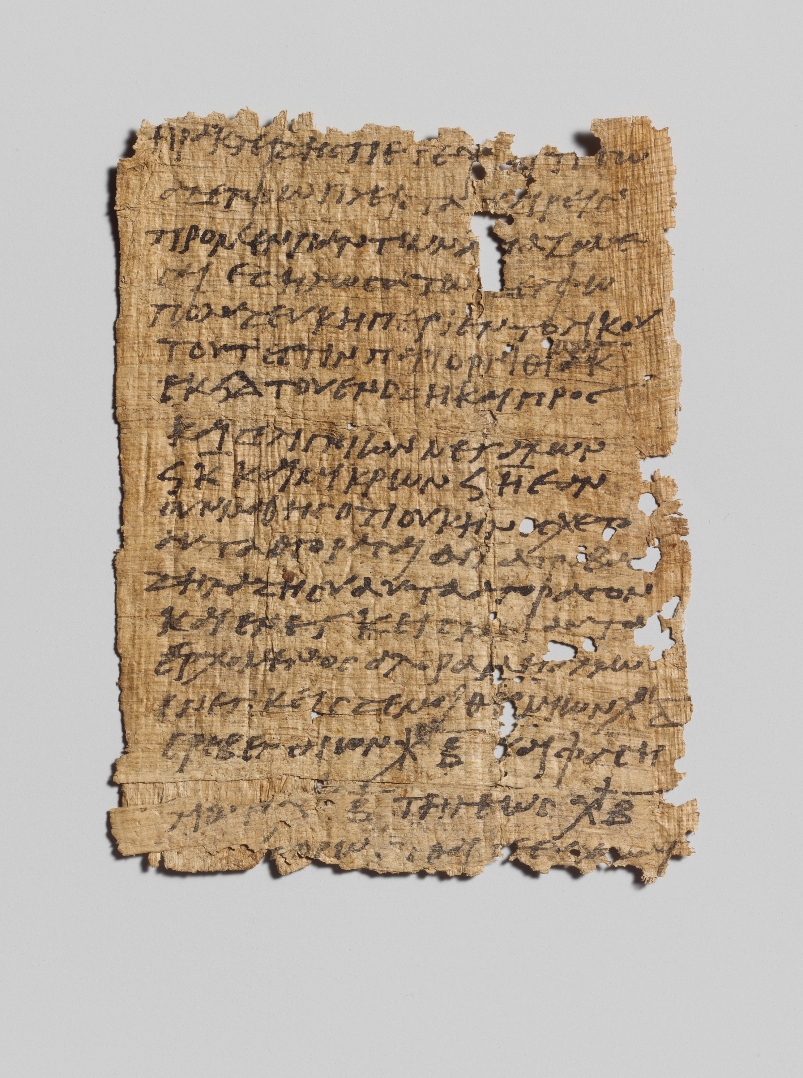 Title: Papyrus in Greek regarding tax issues (3rd ca. BC.)  Currently in the Metropolitan Mueum of Art. https://www.metmuseum.org/art/collection/search/251788 Source: Wikipedia Commons https://commons.wikimedia.org/wiki/File:Papyrus_in_Greek_regarding_tax