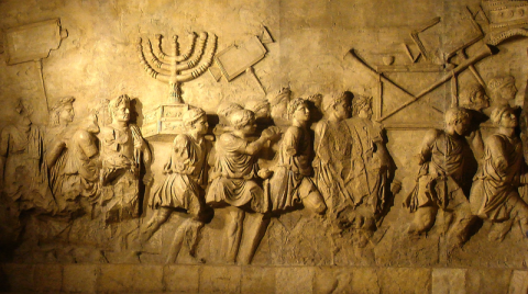 Roman Triumphal arch panel copy from Beth Hatefutsoth, showing spoils of Jerusalem temple. Image via Wikimedia under a CC BY-SA 3.0 License.