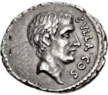 A silver coin with a short-haired man's head facing right. Around the right edge of the coin is written "SVLLA COS"