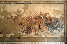 A mosaic depicting a crowd of male soldier on horseback brandishing spears. One man sits atop a chariot higher that the others, wearing a crested helmet and reaching out with his right hand.