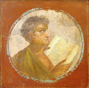 A fresco with a red background. In the middle is a circle, in which a young man reads a papyrus scroll.