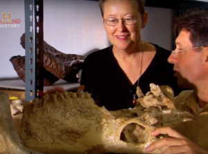 Adrienne Mayor with Nikos Solounias, still image from "Ancient Monster Hunters" (A&E Home Video, 2004)