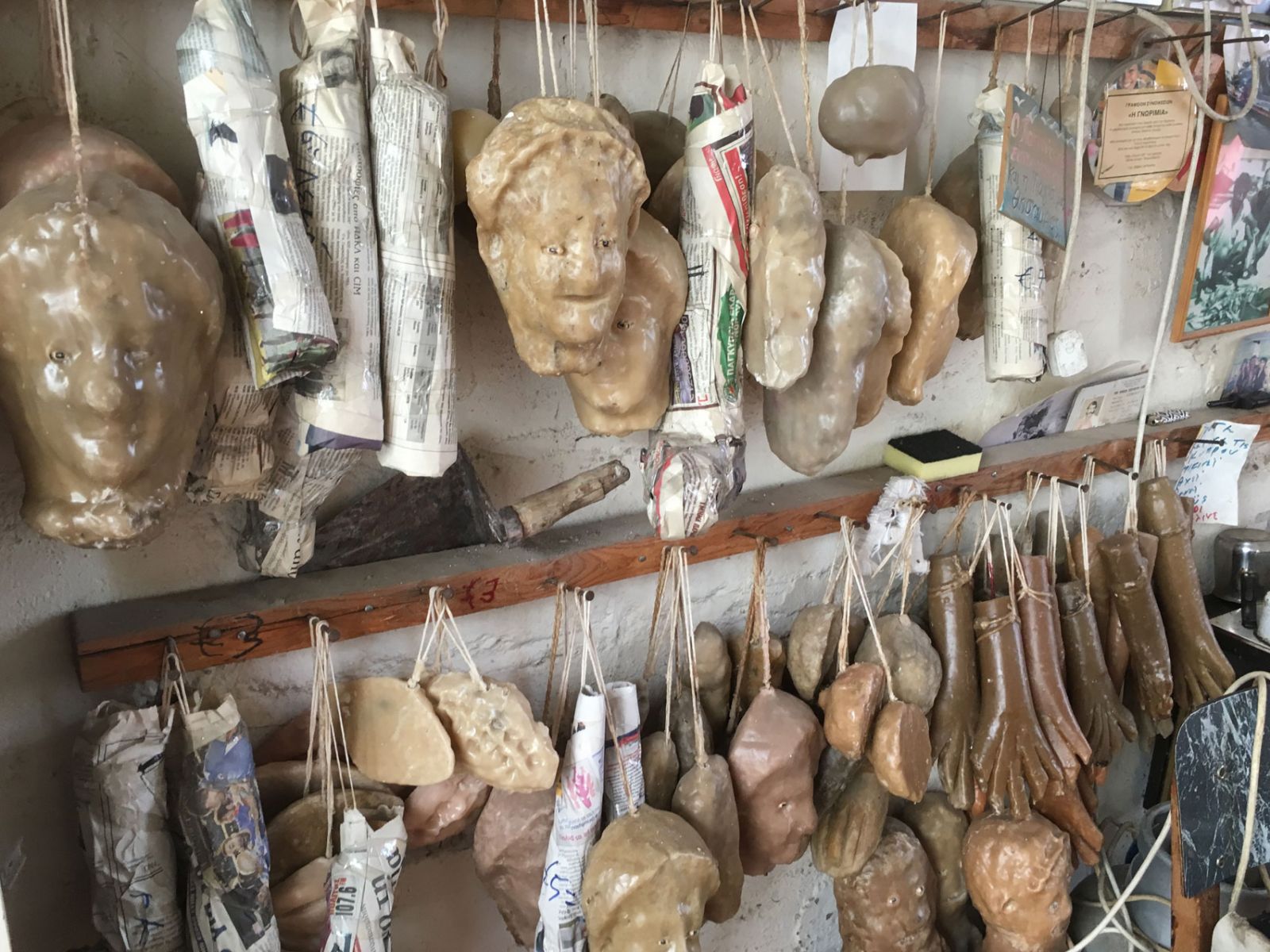 Handmade wax babies, candles and other votive offerings for sale in Larnaca, Cyprus (image by Maureen Carroll and used by permission)