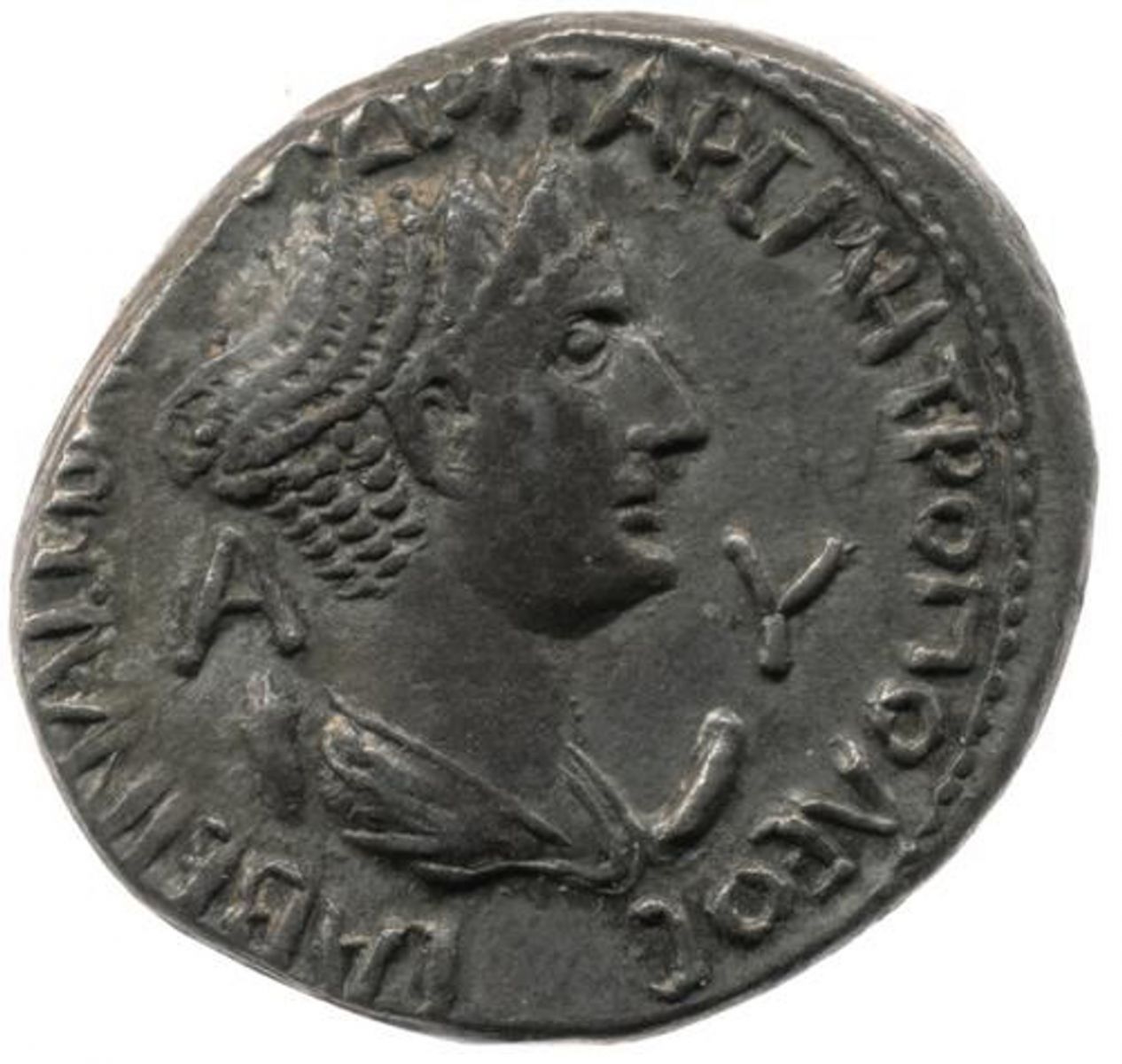 A gray coin with an image of Sabina looking to the right. Her hair is braided into an updo.
