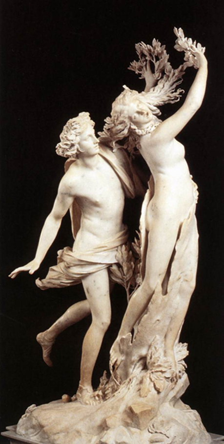 A white marble statue. A young, nude male with curly hair chases after a woman, grabbing her waist. She, also nude, flees from him, as her legs transform into a tree trunk stuck into the ground, and her arms and hair transform into tree branches and leaves.
